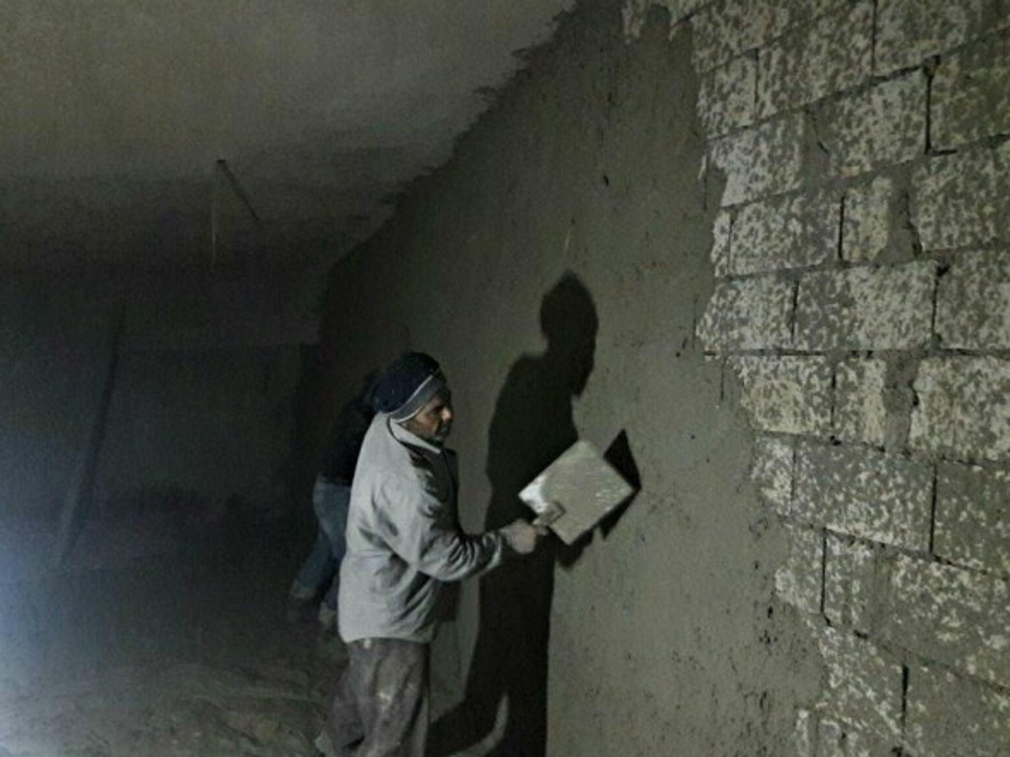 Syrian man helping build the Avicenna Women & Children's Hospital