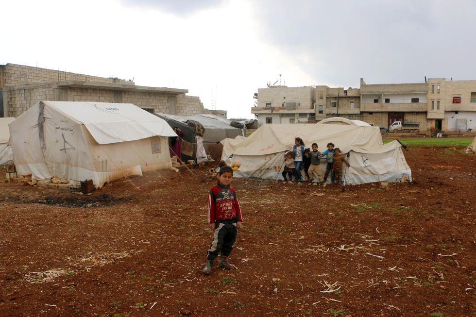 Syrian refugees in a camp outside of the city of Azaz on Syria's northern border with Turkey