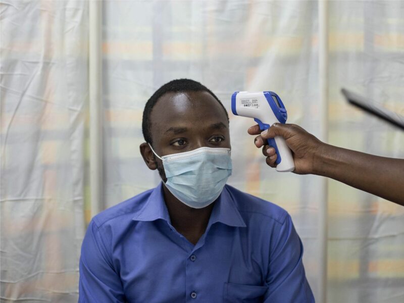 Taking the temperature of a Kenyatta National Hospital staff member in Nairobi