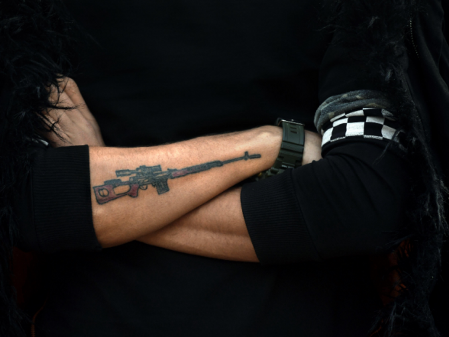 Tattooed fighter in Qandil, Iraq