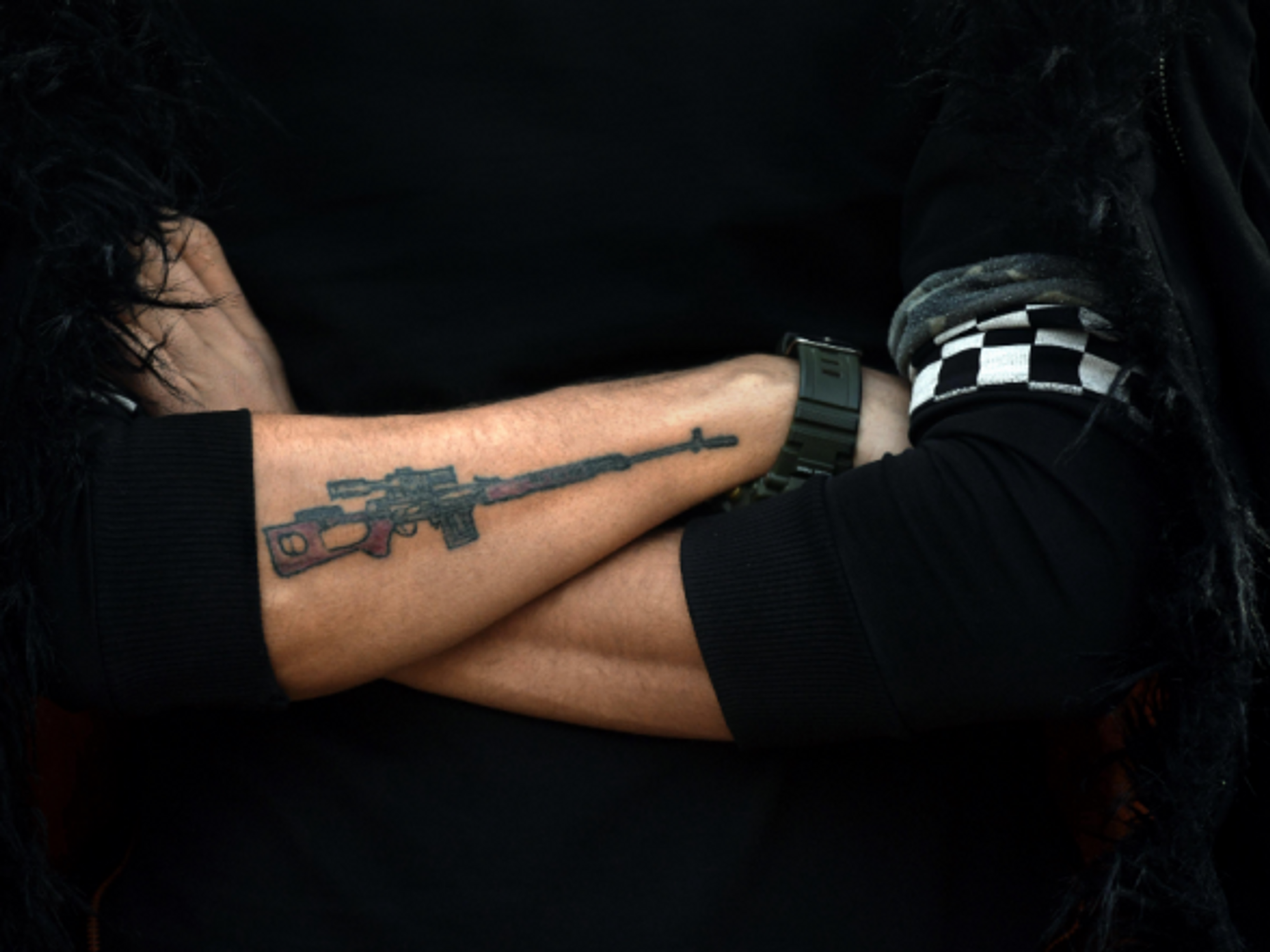 Tattooed fighter in Qandil, Iraq