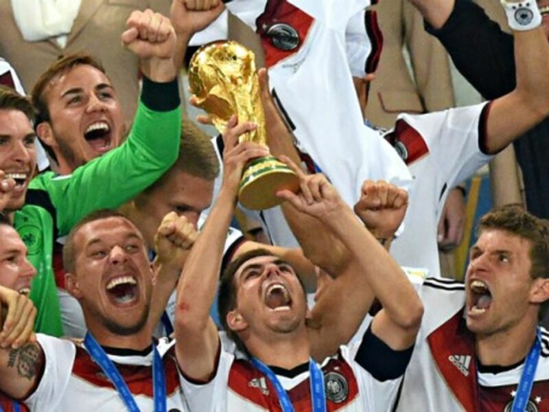 Team captain Philipp Lahm lifts up the World Cup trophy after winning the FIFA World Cup 2014 final soccer game.