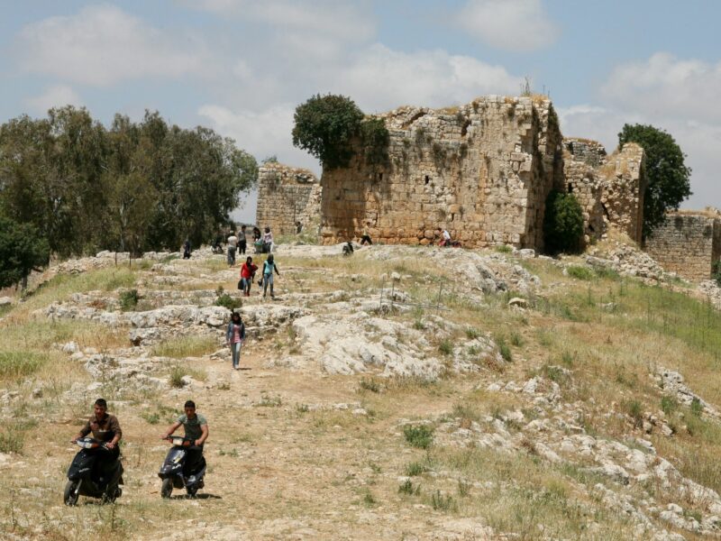 Teenagers leave Qalat Doubba Castle near the village of Shaqra South Lebanon