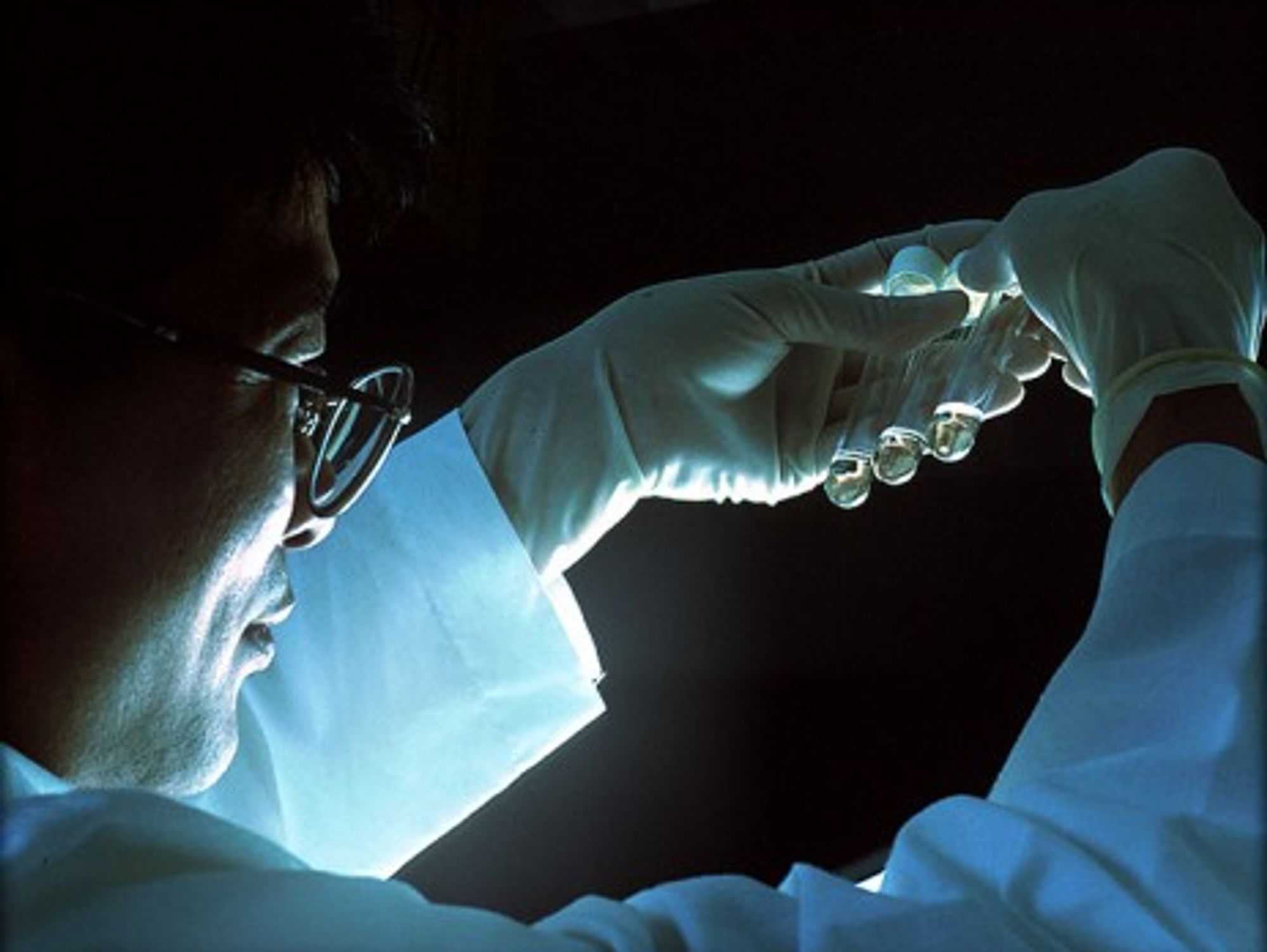 Test tubes containing cells that have been exposed to the AIDS virus