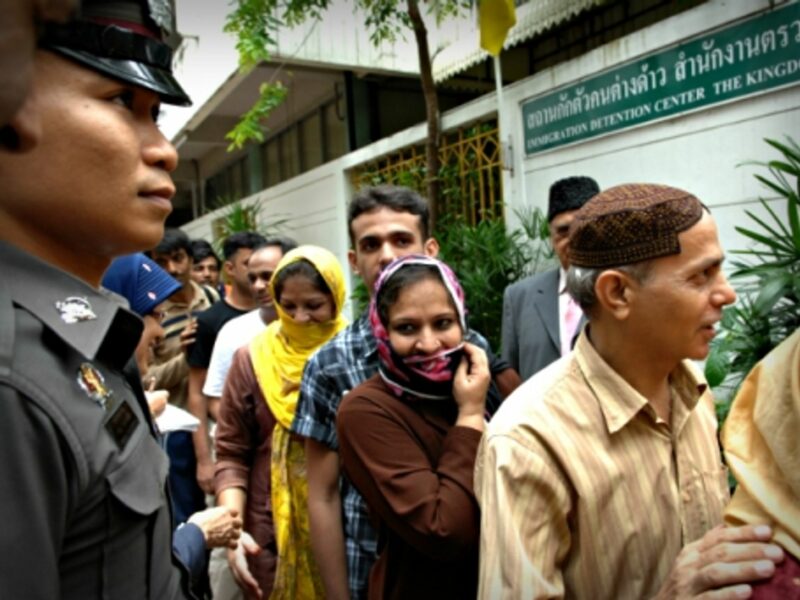 Thai police and Pakistani refugees in Bangkok