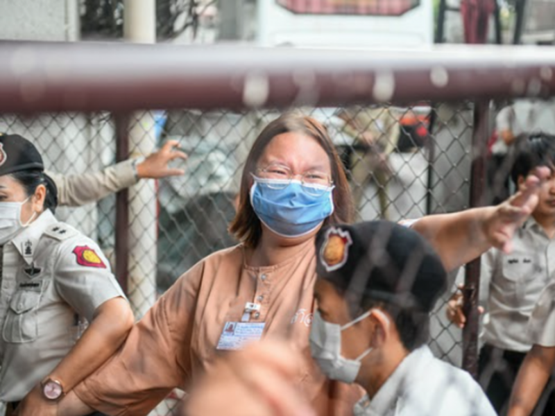 Thai pro-democracy activist Panusaya Sithijirawattanakularrives arrives in Bangkok to face trial for royal defamation.