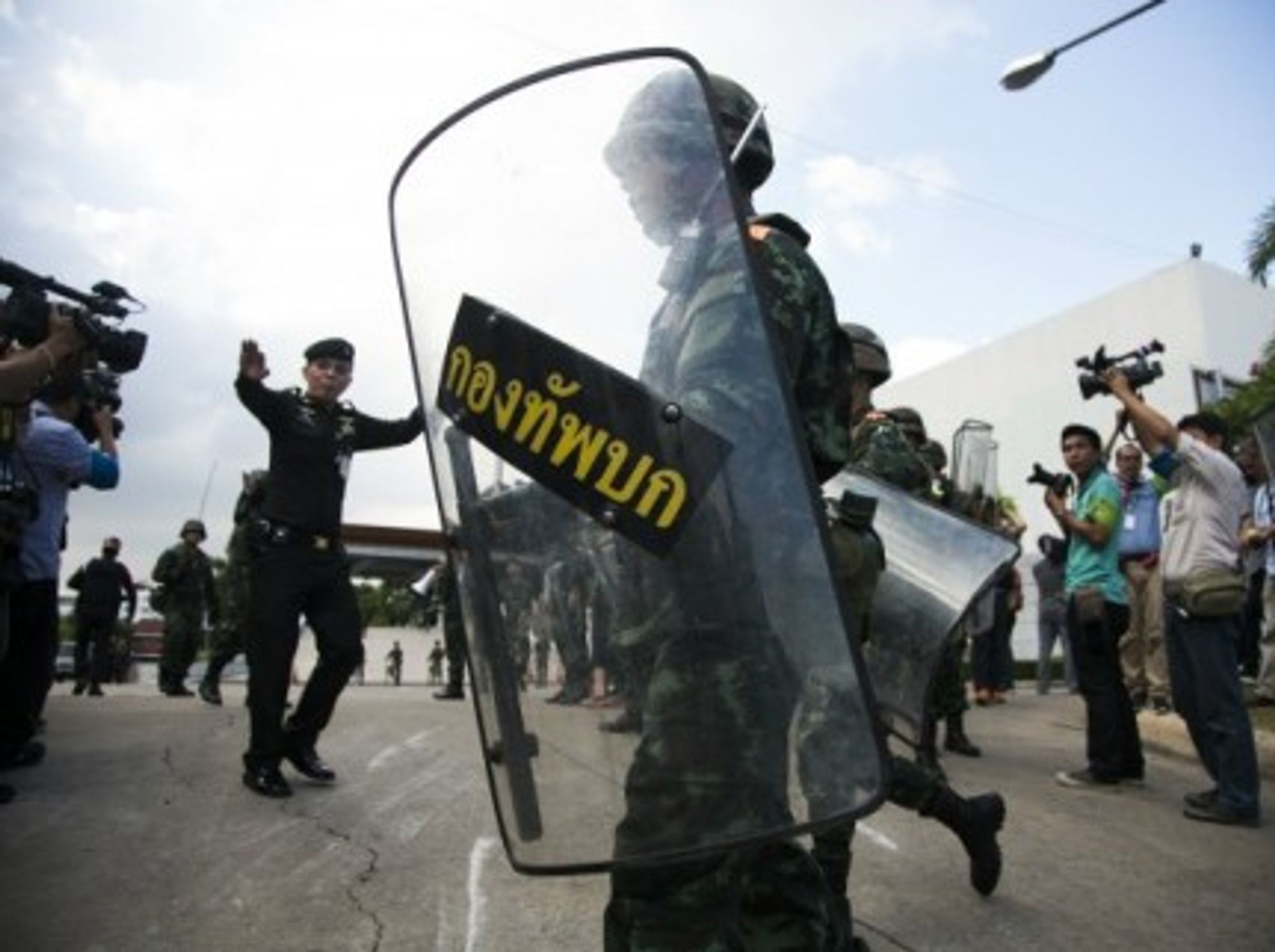 Thailand's military held firm Friday, a day after suspending the constitution and taking power.