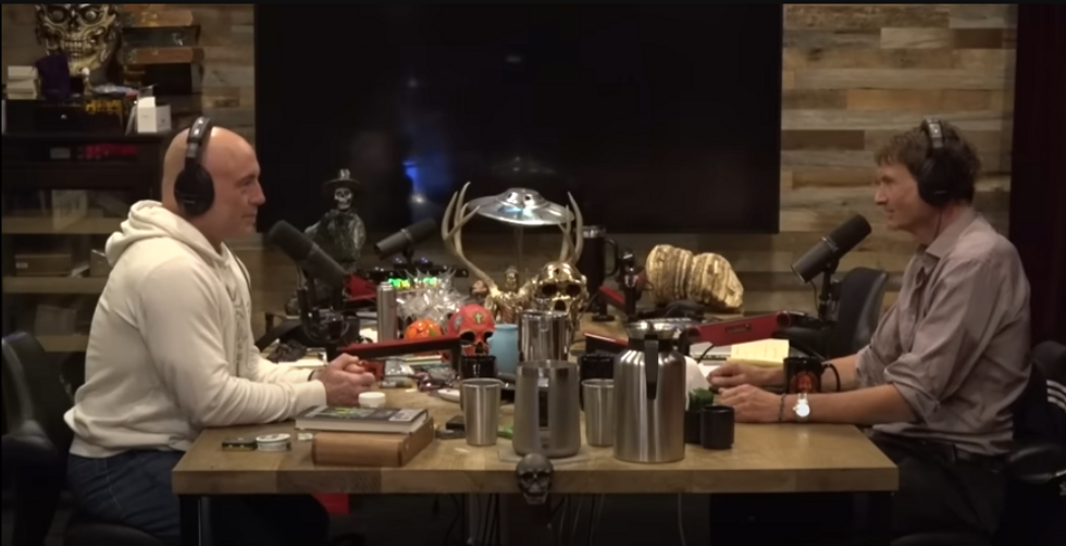 The author (right) speaking to Rogan in August.