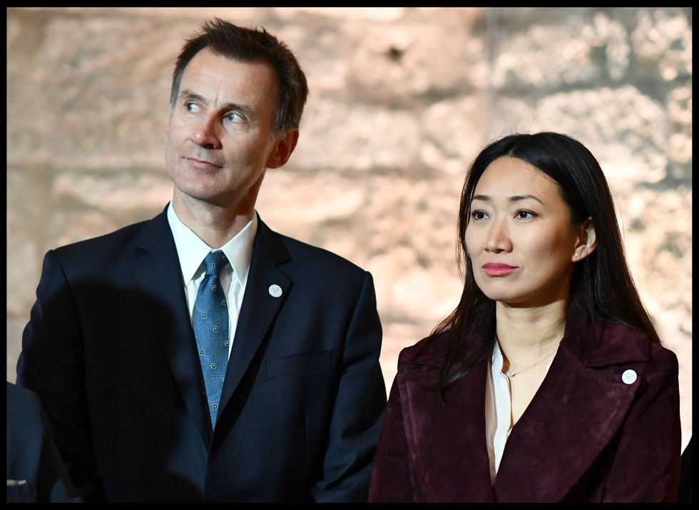 The Chancellor of the Exchequer, Jeremy Hunt, with his wife Lucia Guo