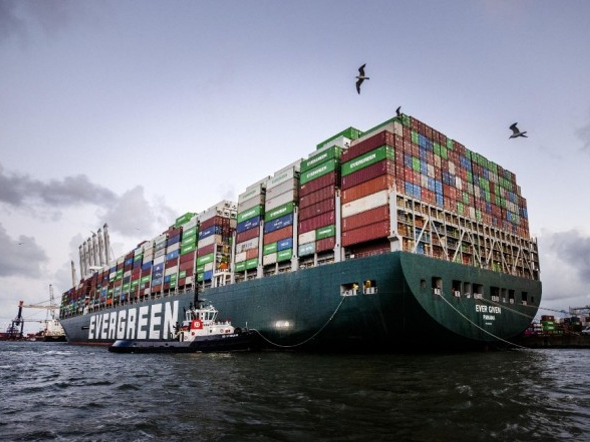 The container ship Ever Given arrives at the ECT Delta terminal in the port of Rotterdam, more than four months after it got wedged in the Suez Canal for six days, blocking shipping in one of the world's busiest waterways