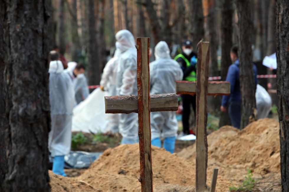 The crosses mark the graves of Izium residents killed by Russian occupiers