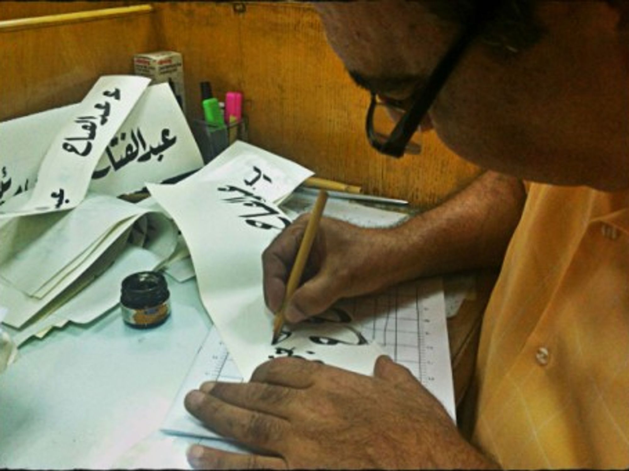 The Egyptian Newspaper Calligrapher Still Writing History's First Draft