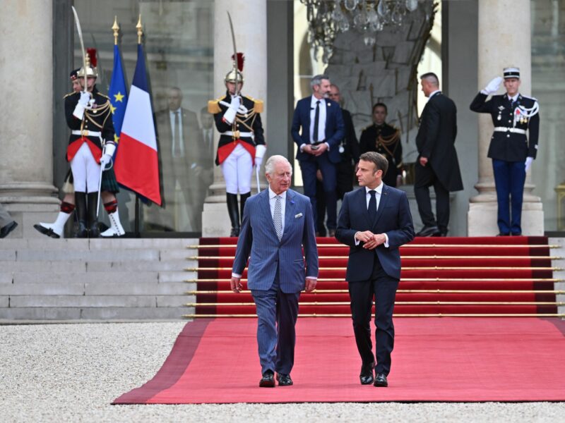 The King and Queen State visit to France-Day One. King Charles III and Emmanuel Macron walk to Elysee Palace.