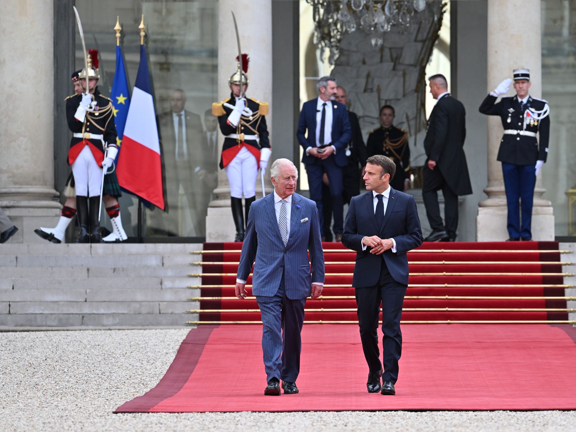 The King and Queen State visit to France-Day One. King Charles III and Emmanuel Macron walk to Elysee Palace.