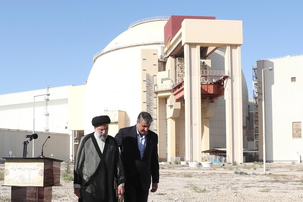 The latest report by the IAEA chief to its governing board says Iran has augmented its enriched uranium reserves
