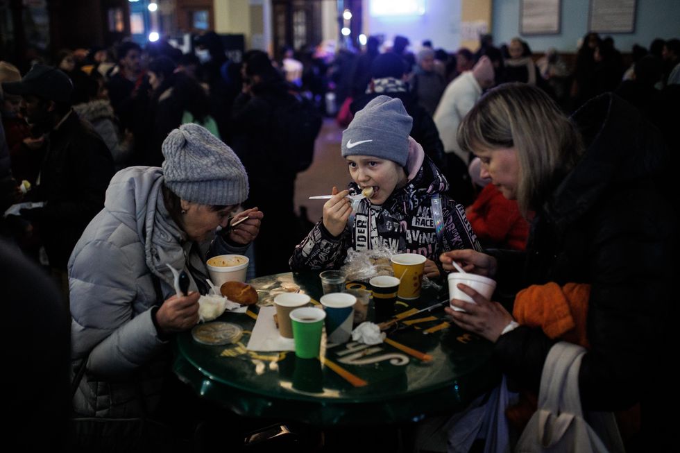 The Lviv train station is hosting thousands of refugees trying to flee Ukraine