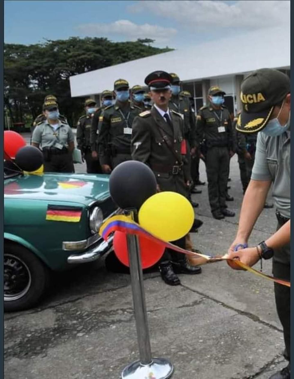 The police school exhibited Nazi memorabilia, including someone dressing up as Hitler and his dog