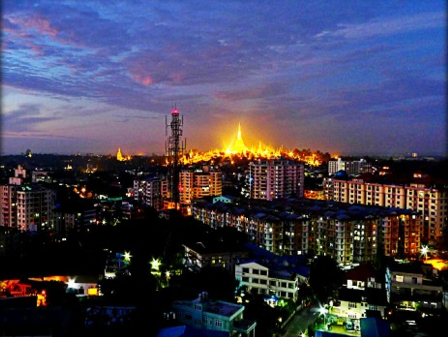 The Shwedagon pagoda dominating the skyline of Rangoon