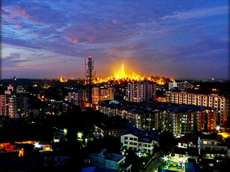 The Shwedagon pagoda dominating the skyline of Rangoon