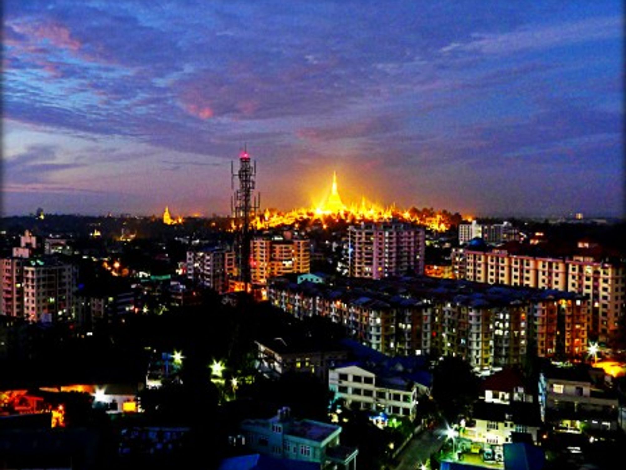 The Shwedagon pagoda dominating the skyline of Rangoon