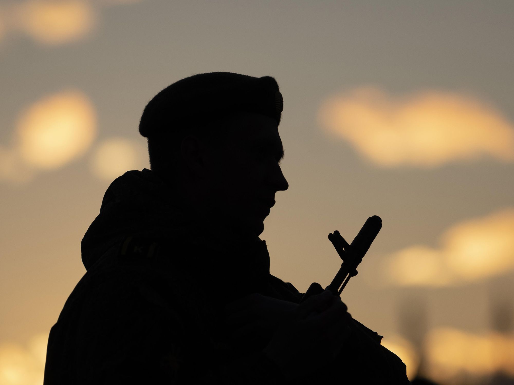 The silhouette of a Russian soldier during a military parade rehearsal.