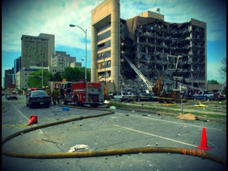The smoldering ruin of the Murrow Building in Oklahoma City in April 1995