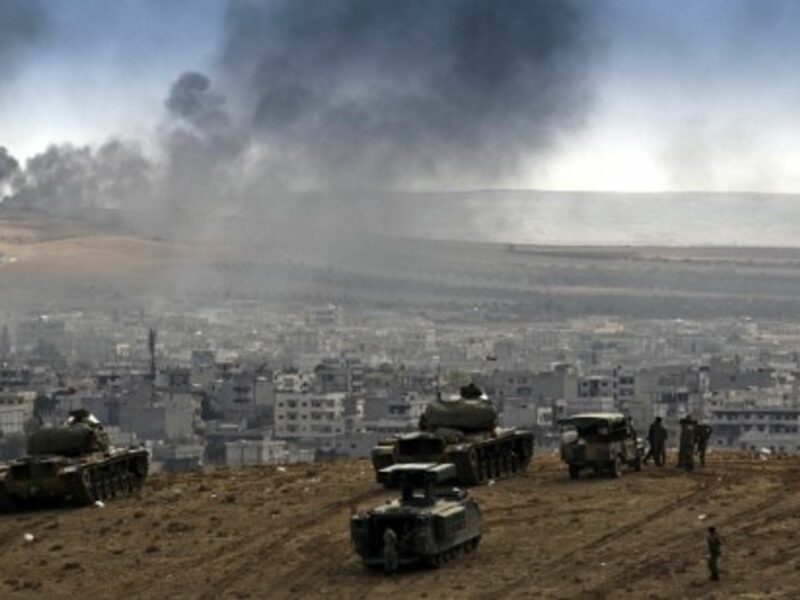 The Turkish military watches the battle in Kobane.