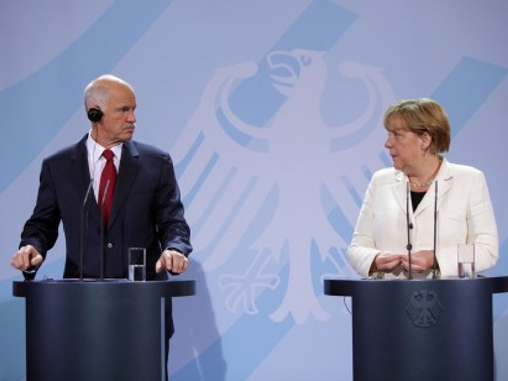 then-Prime Minister George Papandreou of Greece (left) and German Chancellor Angela Merkel in September 2011