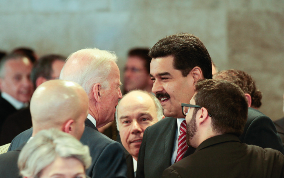 Then U.S. Vice President Joe Biden and Venezuelan President Nicolas Maduro crossing paths in Brasilia in 2015