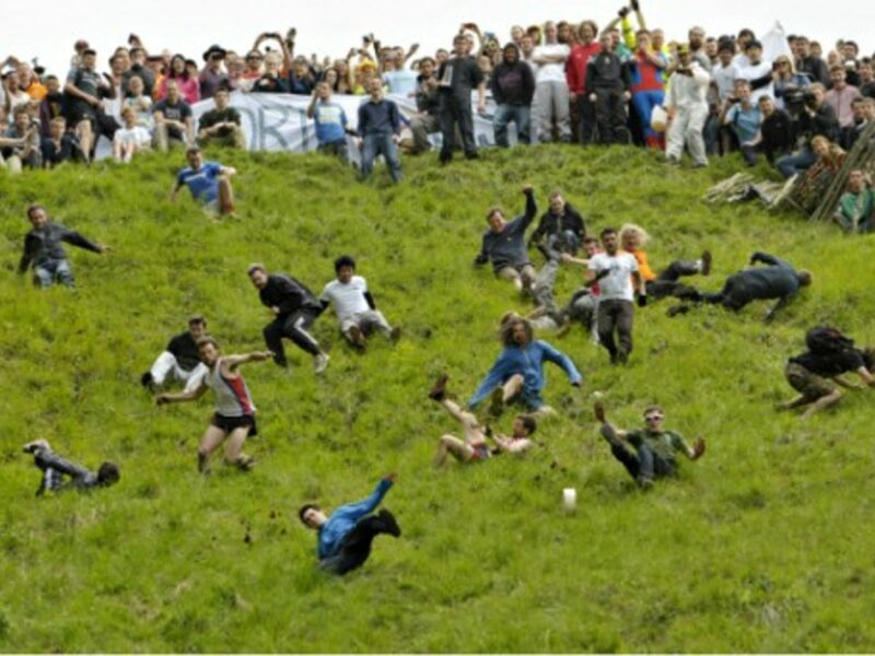 Thousands gathered Monday in Brockworth, UK, for the annual cheese-rolling competition down Cooper's Hill.