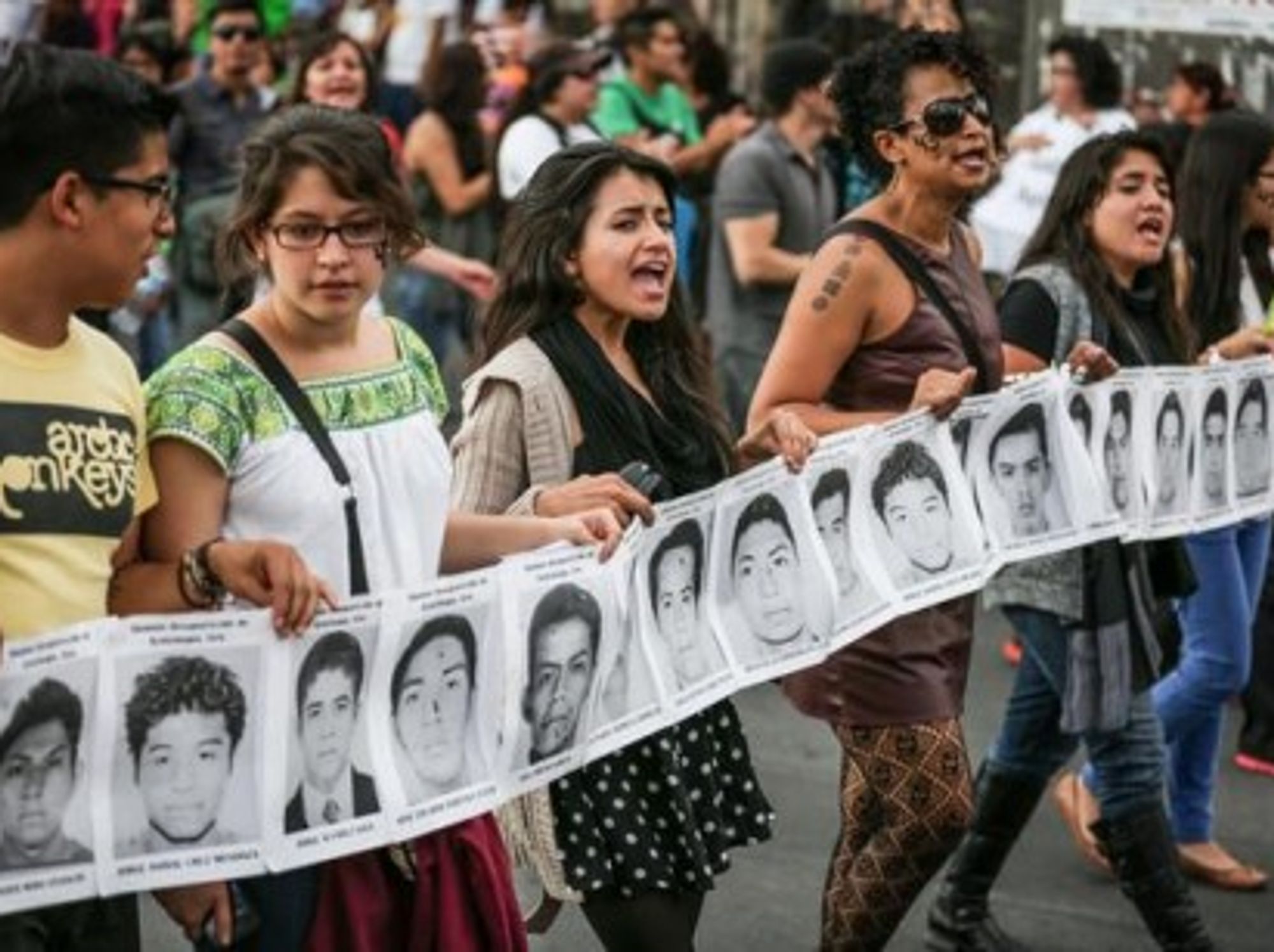 Thousands of angry protesters demonstrated across Mexico as outrage grows over student killings.