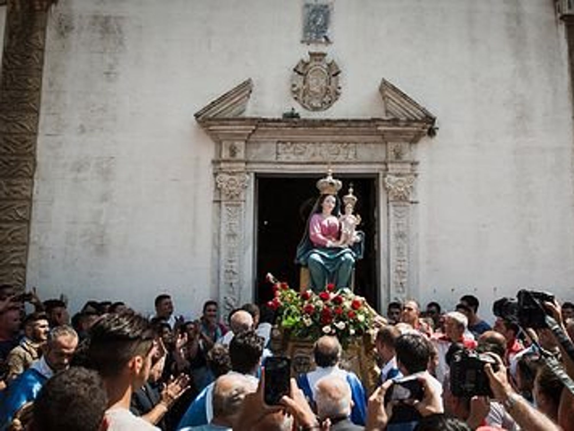 Thousands of devotees join in the procession of Maria di Polsi, Italy.