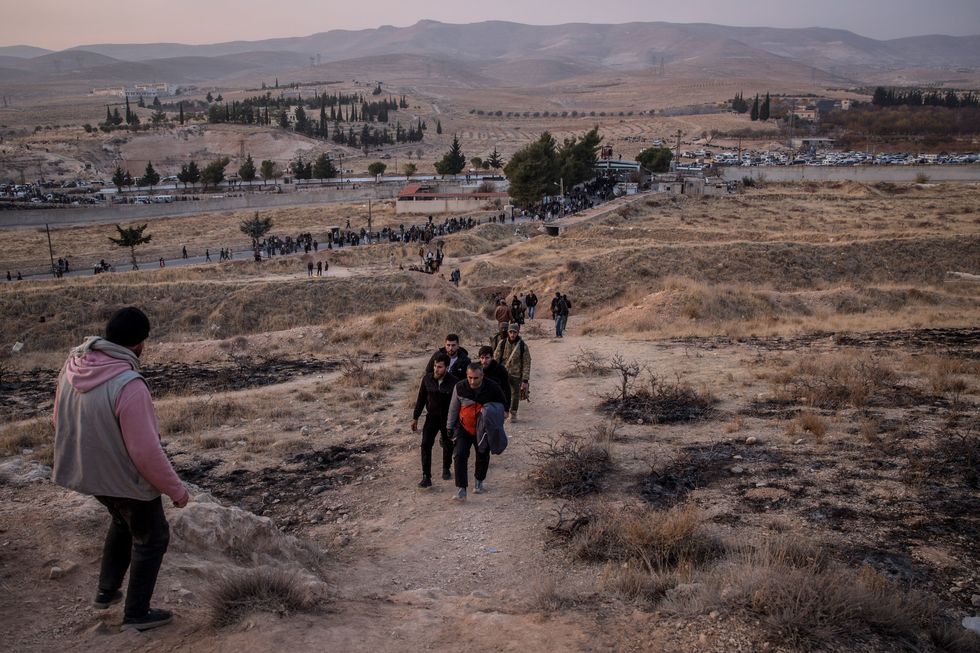 Thousands of people came to Sednaya Prison on the outskirts of Damascus trying to find information about missing friends and family members.