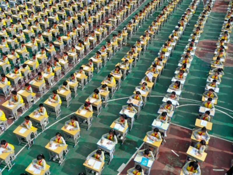 Thousands of schoolchildren participate in a calligraphy competition in Anlong, China