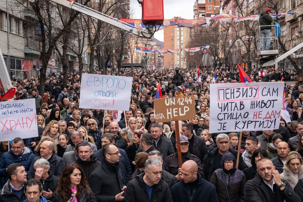 Thousands of Serbian citizens are gathering in the main street of North Mitrovica, Kosovo, on February 12, 2024, to demonstrate against the decision of the Central Bank of Kosovo to ban the Serbian dinar in the country.