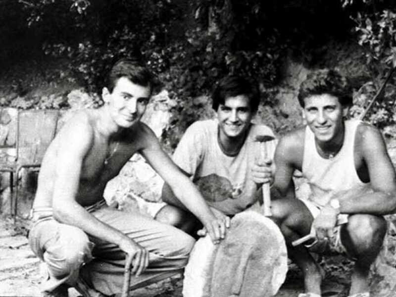 Three Italian college students posed with Modigliani's fake head and the tools with which they made it.