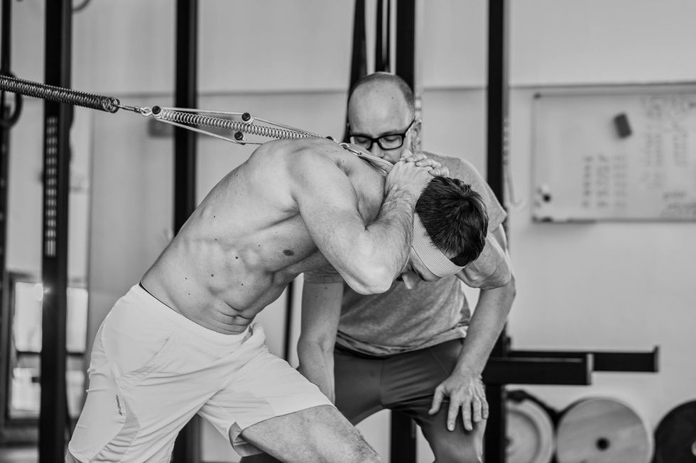 Tony Rockoff instructing Pilates at his studio in Hamburg.