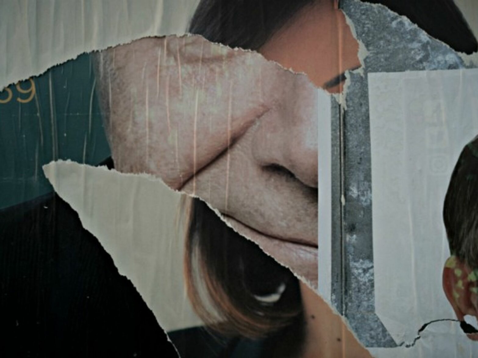 Torn election posters in Naples on March 2