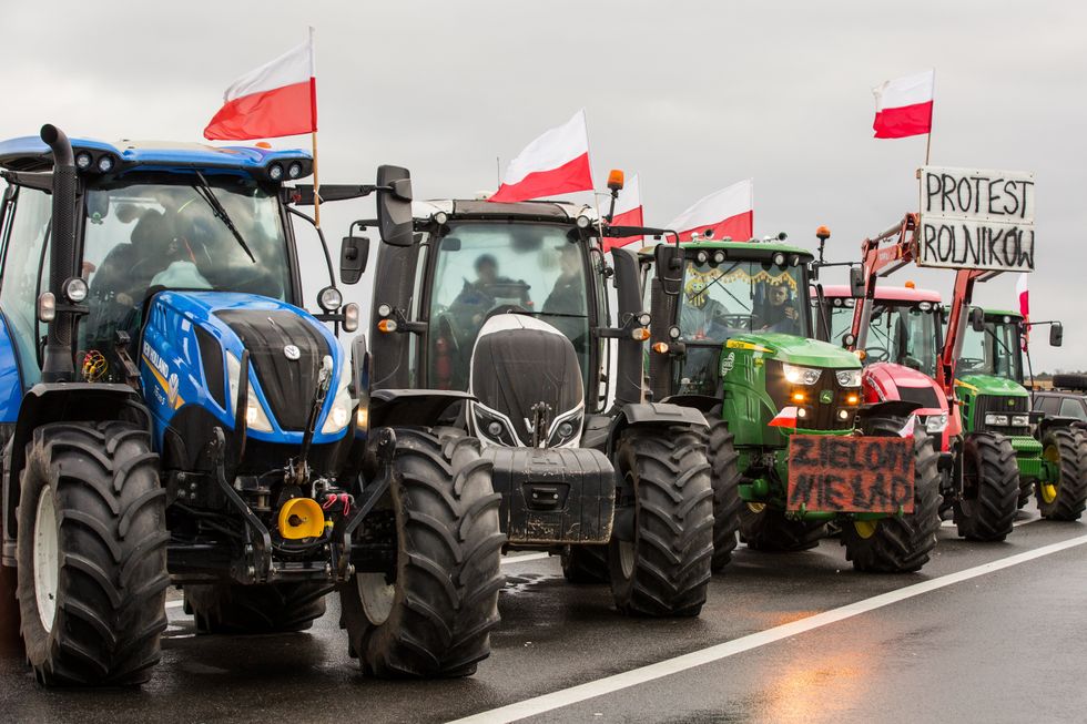 Tractors with polish flags and banners seen along the expressway S3 during the demonstration. Polish farmers are staging protests against cheap Ukrainian grain flooding the market and EU regulations on pesticide and fertiliser usage