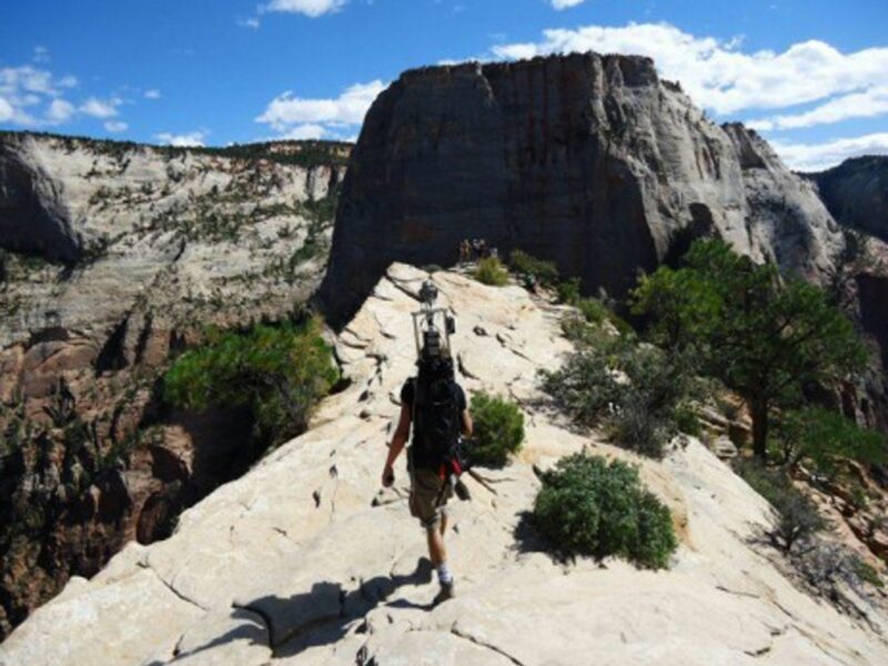 Trail Me Up founder Fabio Zaffagnini recording data in Yosemite Park, California