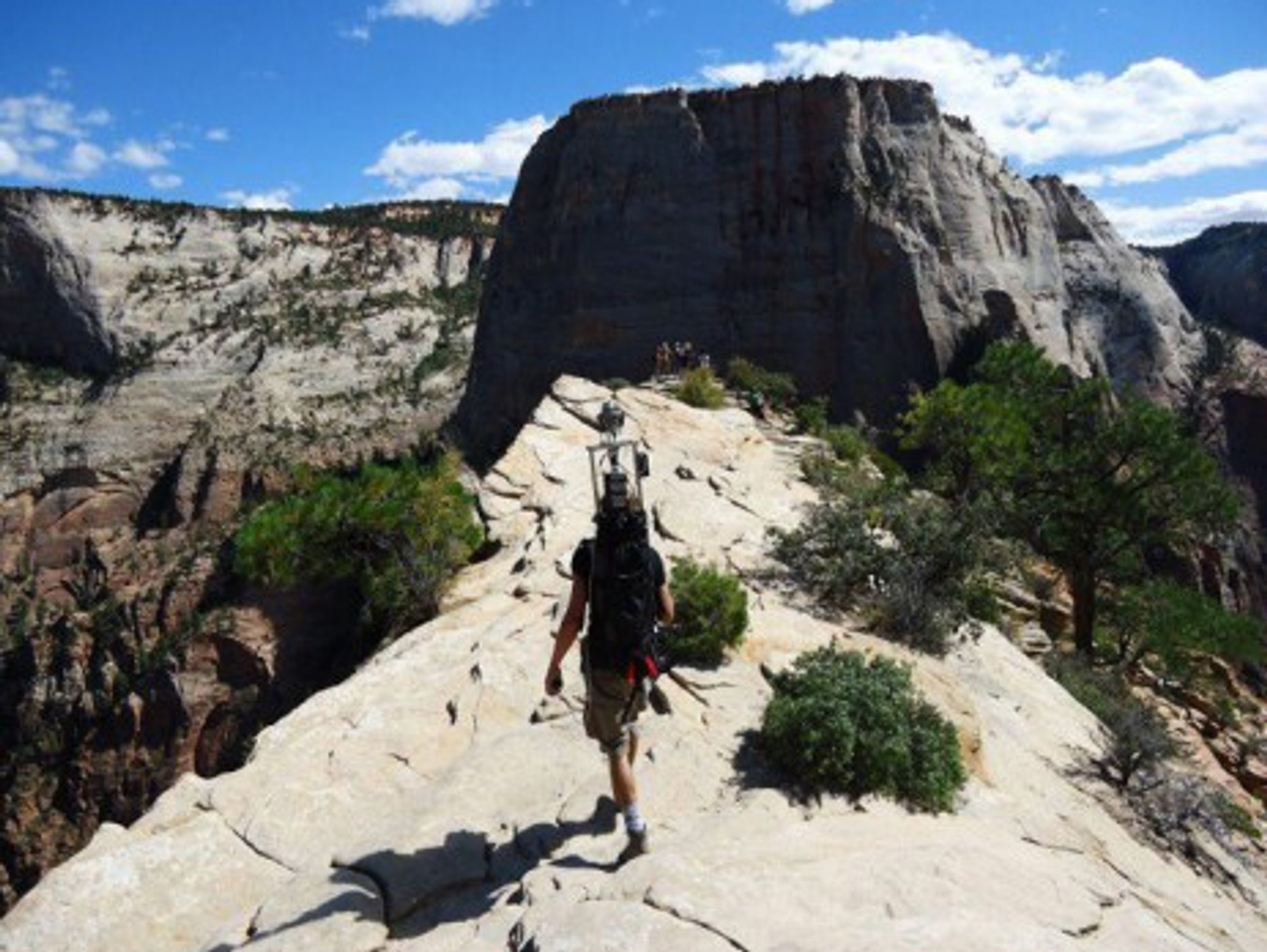 Trail Me Up founder Fabio Zaffagnini recording data in Yosemite Park, California