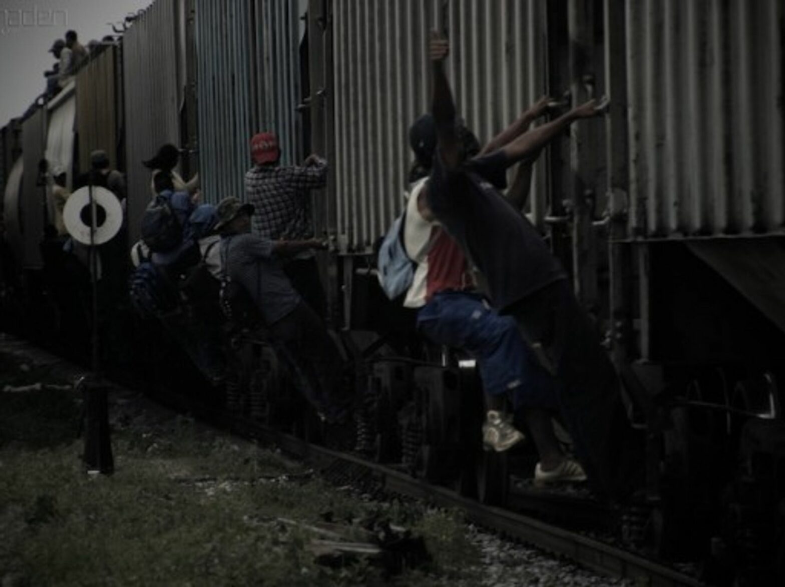 Train surfing migrants in Mexico