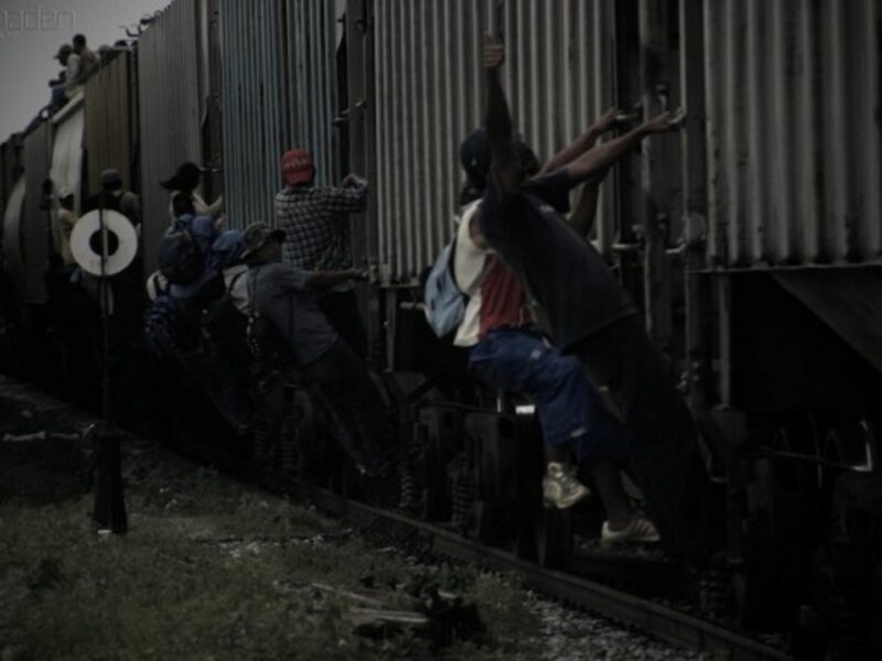 Train surfing migrants in Mexico