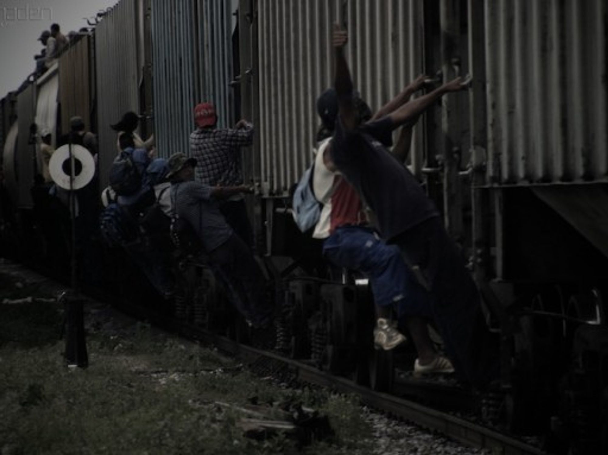 Train surfing migrants in Mexico