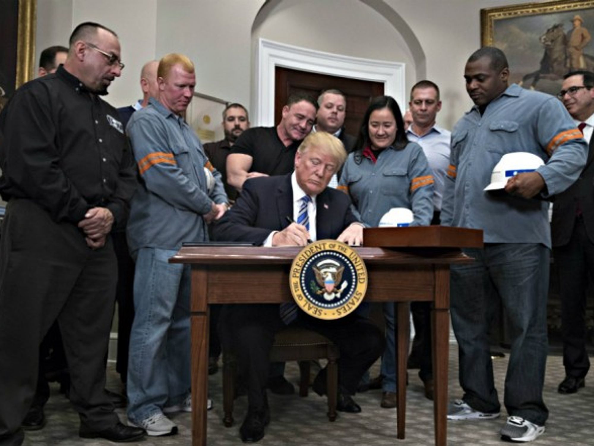 Trump signs steel tariffs in Washington on March 8