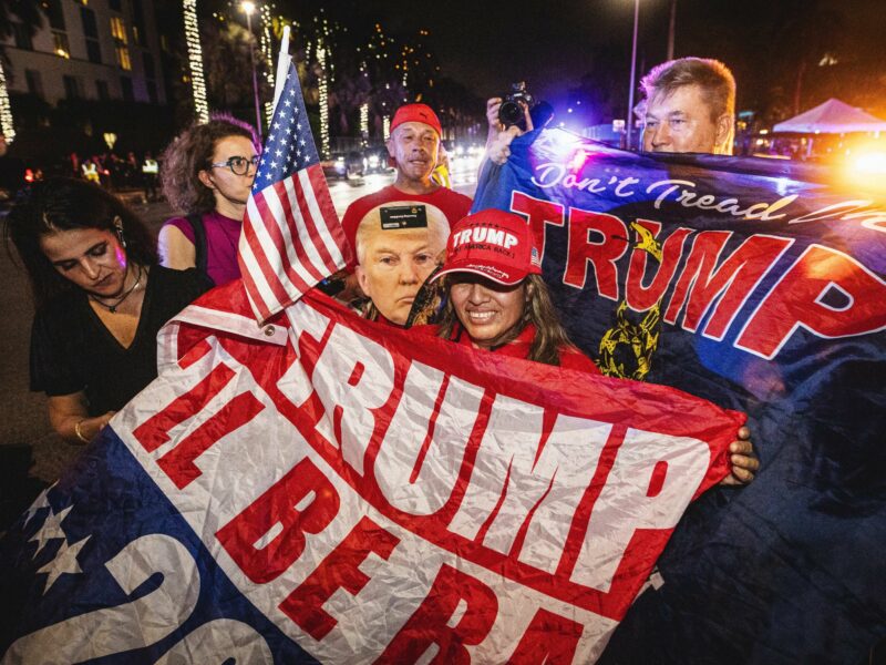 Trump supporters rally outside of the Palm Beach Convention Center as they celebrate the results of the 2024 presidential elections.