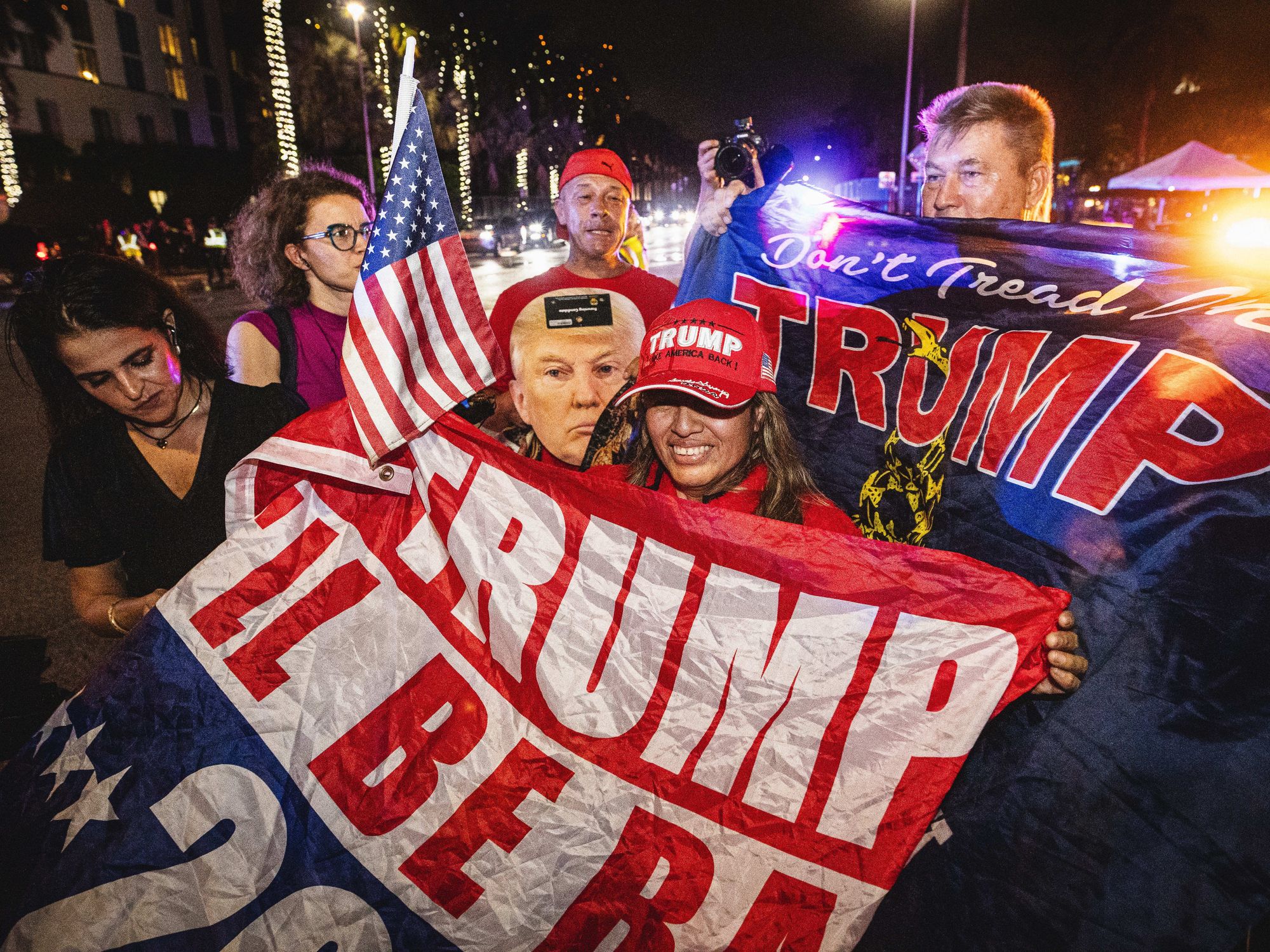 Trump supporters rally outside of the Palm Beach Convention Center as they celebrate the results of the 2024 presidential elections.