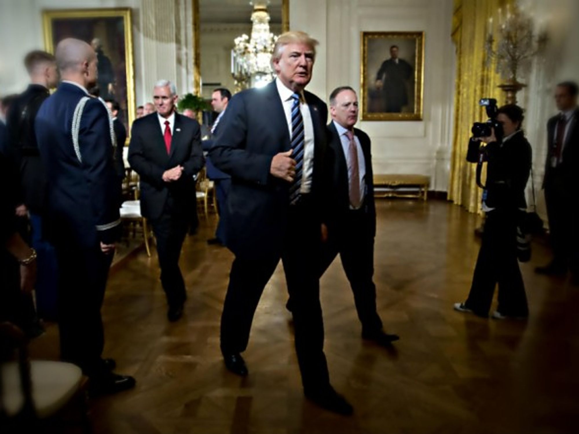 Trump with VP Pence and Press secretary Spicer