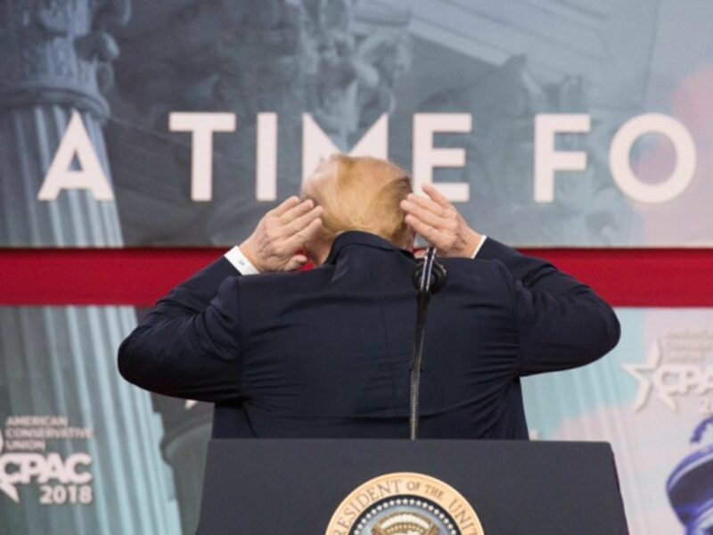 Trump working his hair