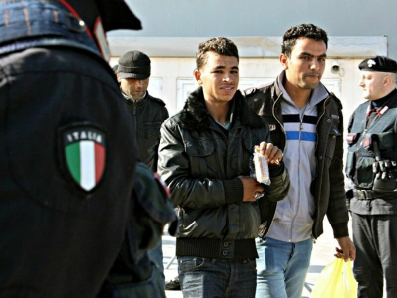Tunisian migrants arriving in Lampedusa